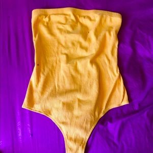 yellow bodysuit